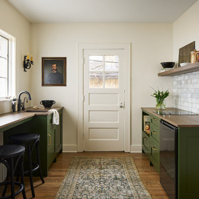 Inspiration for a small timeless single-wall medium tone wood floor and brown floor kitchen pantry remodel in Chicago with an undermount sink, open cabinets, medium tone wood cabinets, wood countertops, gray backsplash, marble backsplash, black appliances and brown countertops