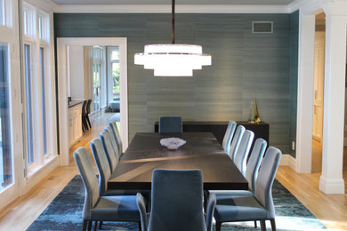 Example of a mid-sized trendy light wood floor kitchen/dining room combo design in Providence with multicolored walls