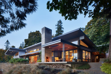 Example of a large minimalist two-story exterior home design in Seattle