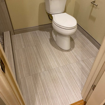 MASTER BATHROOM - Tub-To-Shower 12" x 24" Gray Porcelain Tile Vertically Aligned