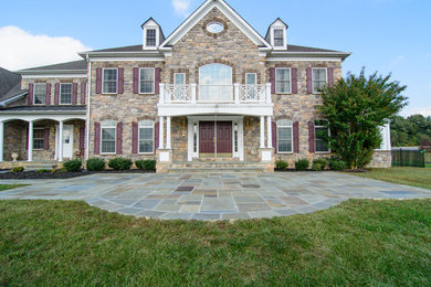 Inspiration for a huge transitional backyard stamped concrete patio kitchen remodel in DC Metro with a pergola