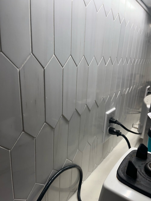 Marble backsplash is not flush