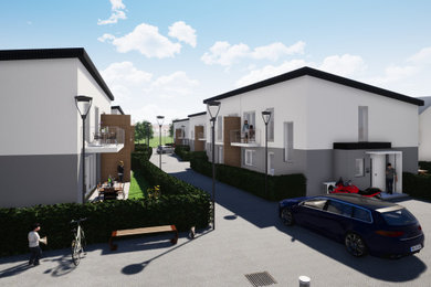 Große, Zweistöckige Klassische Doppelhaushälfte mit Putzfassade, weißer Fassadenfarbe, Pultdach, Ziegeldach und schwarzem Dach in Sonstige