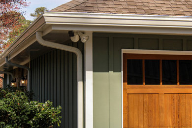Green concrete fiberboard and board and batten house exterior photo in Atlanta