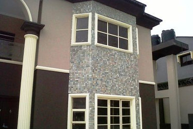 Home design - mid-sized modern home design idea in Other