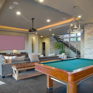 Contemporary home cinema in Portland with grey walls and grey floors.