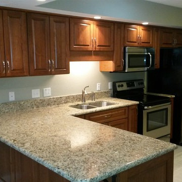 Kitchen Remodel done with Cabinet Refacing and New Cabinets