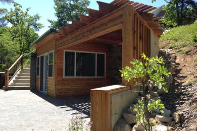 Example of a beach style sunroom design in Little Rock