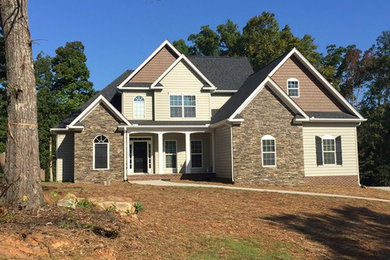 Example of an arts and crafts exterior home design in Other