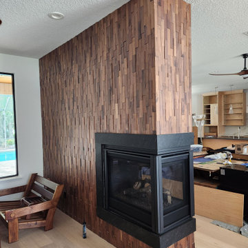 Modern Fireplace Feature Wall with Walnut 3D Wood Panels