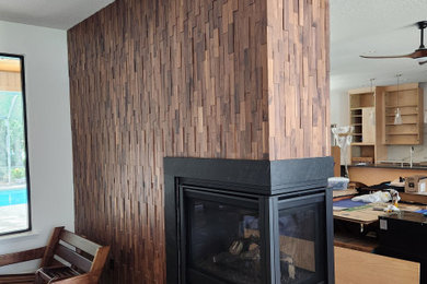 Mid-sized minimalist wood wall living room photo in Miami
