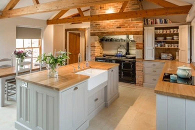 Design ideas for a traditional kitchen in Sussex.