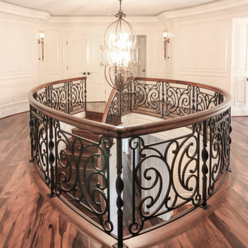Project #74 | Circular Staircase with Hand-Forged Metal Panels