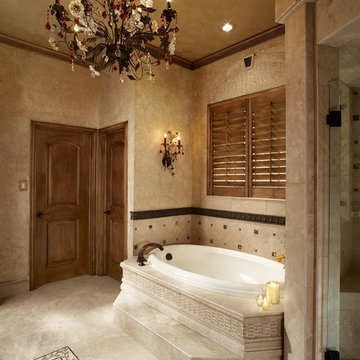 Warm, Elegant Bathroom with Dark Wood Cabinets