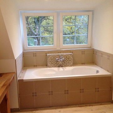Bathroom with shower and tube