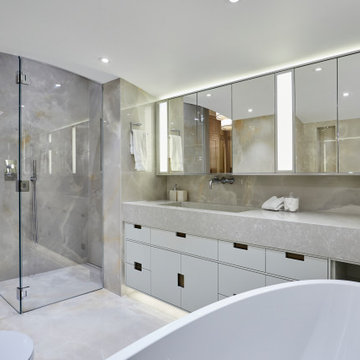 Luxury Master Bathroom Suite with Onyx Marble and Custom Floating Vanity
