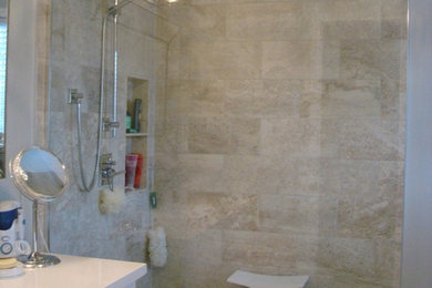 Example of a transitional bathroom design in Toronto