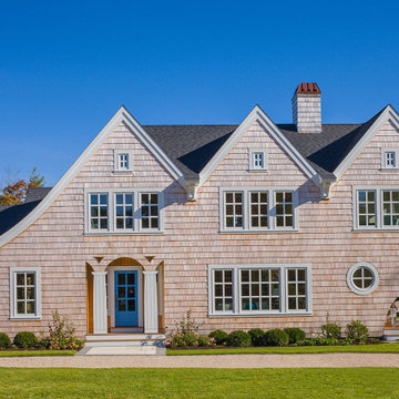 Bright blue door with flat “carpenter’s” columns - Sea Change - Custom H