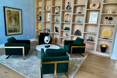 Inspiration for a large contemporary open concept light wood floor and beige floor living room remodel in Houston with a music area, blue walls, no fireplace and no tv