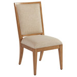 Barclay Butera - Eastbluff Upholstered Side Chair - The classic design of the Eastbluff dining chair marries a wooden frame, shown in the Sandstone finish, with welted upholstered panels on the inside and outside back of the piece. The design comes standard in the Ventura pattern 423311, and is also available in the Sailcloth finish as 921-881-01.