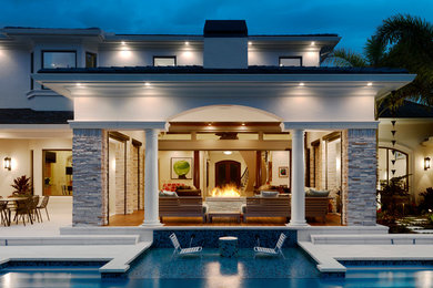 Inspiration for a large contemporary pool in Tampa.