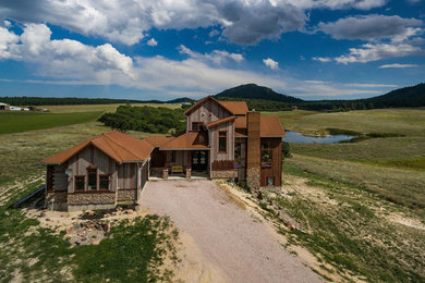 Mid-sized mountain style exterior home photo in Denver