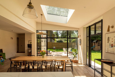 Large contemporary dining room in Cambridgeshire.
