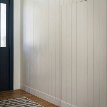 Hidden Shiplap Coat Closet Door in Organic Modern Entryway