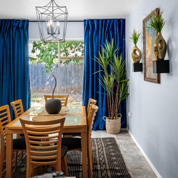 Dining Area with Blue Drapes