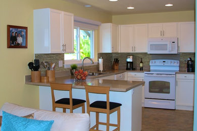 Huge minimalist l-shaped eat-in kitchen photo in Hawaii with open cabinets, light wood cabinets and glass tile backsplash