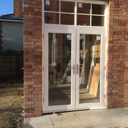 Timber Bi-fold doors with fanlight windows over - Home Improvement