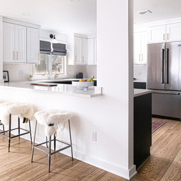 White and Graphite Kitchen with Peninsula Seating