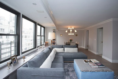 Mid-sized transitional open concept dark wood floor and brown floor family room photo in New York with gray walls