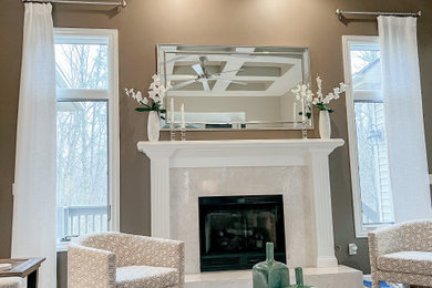 Example of a large transitional open concept gray floor and coffered ceiling living room design in Other with a standard fireplace and a tile fireplace