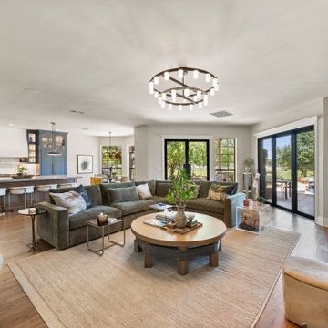 Modern Great Room with Arched Built-Ins and Low-Profile Sectional