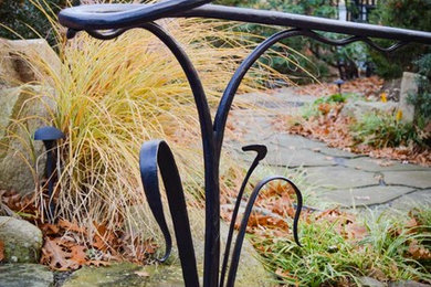 Design ideas for a mid-sized asian partial sun courtyard stone landscaping in Boston.