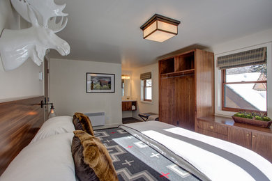 Bedroom - rustic bedroom idea in Denver