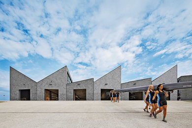 Example of a minimalist metal exterior home design in Chicago