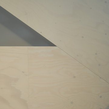 Designertreppe aus weiß geölten Massivholzplatten