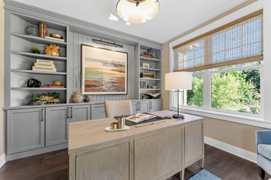 Home office - large transitional freestanding desk brown floor home office idea in Other with gray walls