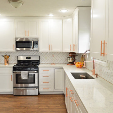 Goshen, IN. BaileyTown USA Select. White Kitchen with Rose Gold Accents