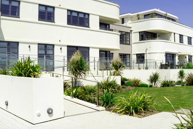 Home design - coastal home design idea in Sussex