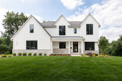 Example of a country exterior home design in Detroit
