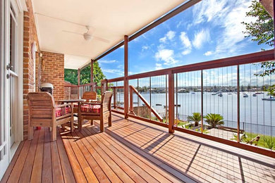 This is an example of a beach style home design in Sydney.