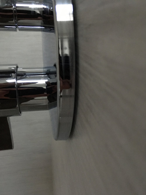 Shower faceplate not flush with tile