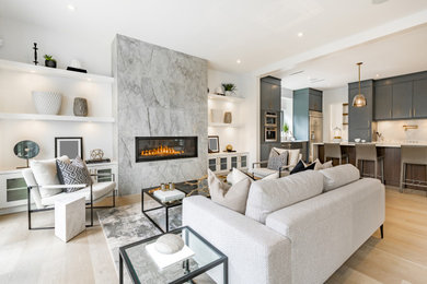 Mid-sized trendy open concept living room photo in Other with white walls and a tile fireplace