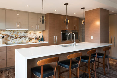 This is an example of a mid-sized contemporary u-shaped eat-in kitchen in Miami with a double-bowl sink, flat-panel cabinets, light wood cabinets, granite benchtops, brown splashback, marble splashback, stainless steel appliances, bamboo floors, with island, brown floor and brown benchtop.