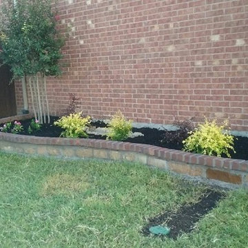 Flowerbed mortared Stone edging