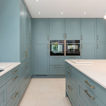 Aldana Kitchen in Light Teal by Kitchen Ergonomics