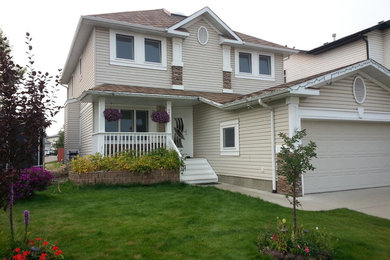 Example of an arts and crafts exterior home design in Calgary